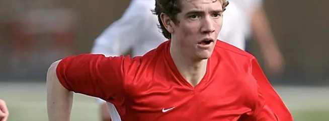 a soccer team member playing in a virtual reality environment.